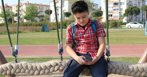Young boy using smartphone 18 Video stock 88402056