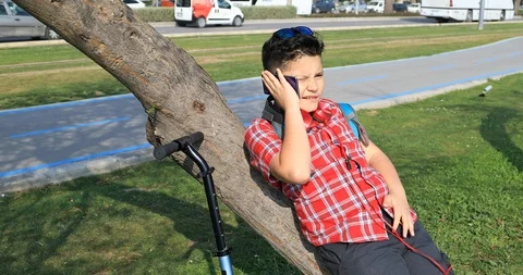 Young boy using smartphone 7 Stock-Footage 88396705