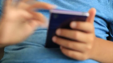 Young boy using smartphone at home 2 Video stock 83013293