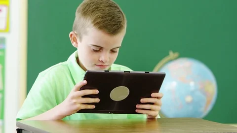Young boy using tablet in class Stock-Footage 80131378