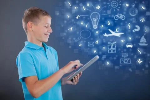 Young boy using tablet,school learning or technology concept Stock Photos