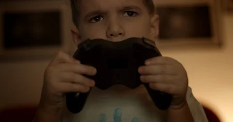 Young boy using video game console. Stock Footage 127811575