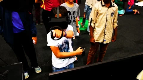 A young boy using virtual reality technology Stock Footage 338315782