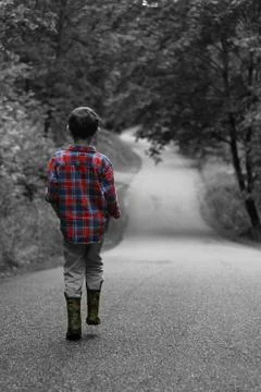 Young Boy Walking Down Path Stock Photos