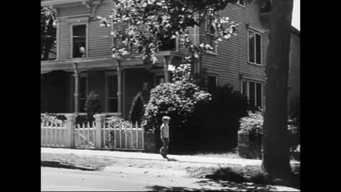 Young Boy Walking On Street Returning Home Stock Footage 119274613