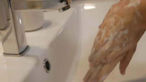 Young boy is washing hands Stock Footage 149870133