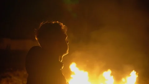 Young Boy watching at the fire, sad emotions Stock Footage 122322051