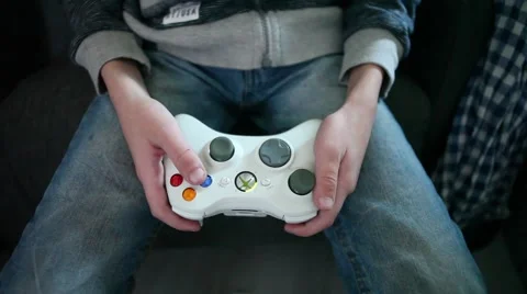 Young boy with X-Box controller Stock Footage 45440981