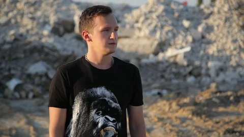 Young boylooking at camera in construction 库存影片 94442321