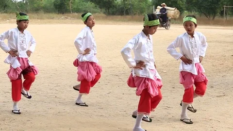 Young boys dancing in donation ceremony. Bagan, Myanmar, Burma Stock Footage 75020982