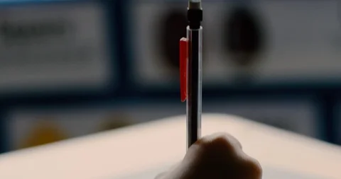 Young boy’s hands as he writes in a notebook in a classroom Stock Footage 108792331
