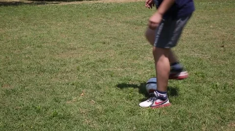 Young boys playing soccer Stock Footage 50857792