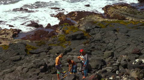 Young Boys Preparing to Spear Fish Stock Footage 35226373