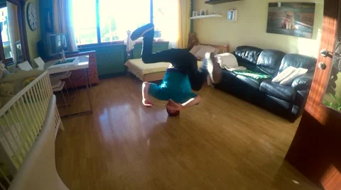 Young breakdancer in the room, 4K Stock Footage 45923773