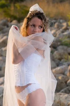 Young bride on the beath Stock Photos