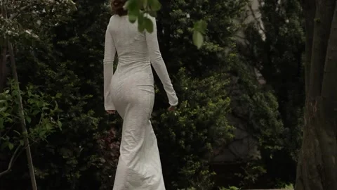 Young bride in elegant figure hugging dress Stock Footage 314341909