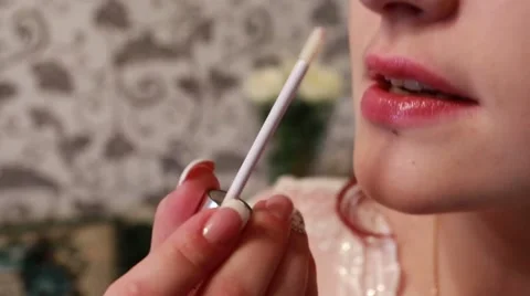 Young bride paints lips before wedding Video stock 51970116