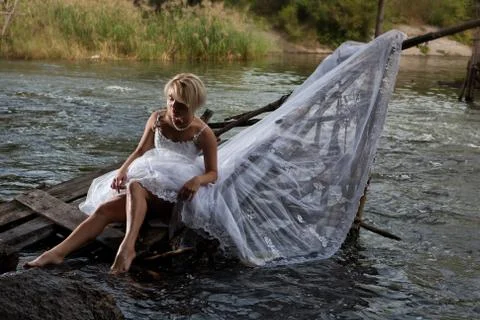 Young Bride On A River Stock Photos