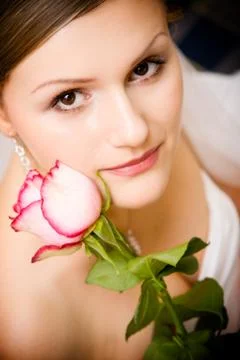Young bride with a rose Stock Photos