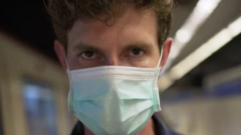 Young british man model in a protective medical mask, against the background of Stock Footage 138839902