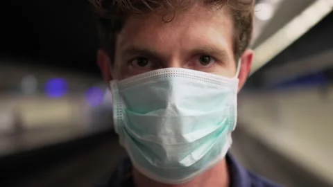 Young british man model in a protective medical mask, against the background of Stock Footage 144671609