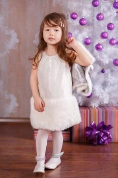 Young brunette dolly lady girl stylish dressed in cosy evening official white Stock Photos