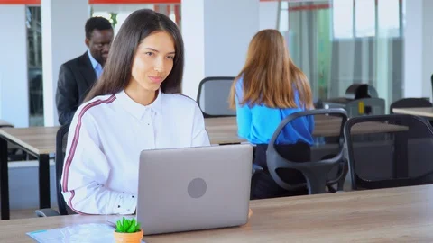 Young brunette shows like in office Stock Footage 111759576