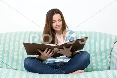 Young brunette teenager studying Stock Photos