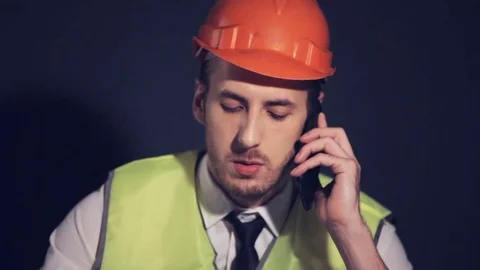 Young Builder on the phone Stock-Footage 81268341