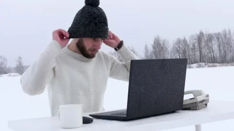 A young business man during a lockdown works on a computer. Office manager works Stock Footage 148499884