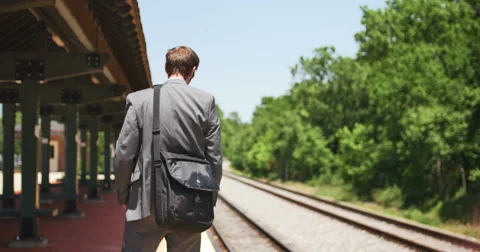 Young Business Man Excited Waiting for Train Commuting to Work, 4K Stock Footage 64060341