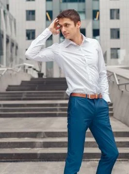 Young business man posing on camera Stock Photos