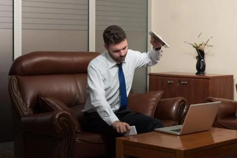 Young Business Man With Problems In The Office Foto stock