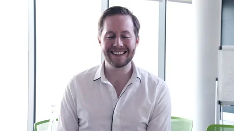 Young Business man smiling in conference room Stock Footage 59381292