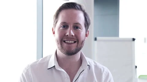 Young Business man smiling in conference room Stock Footage 59381359