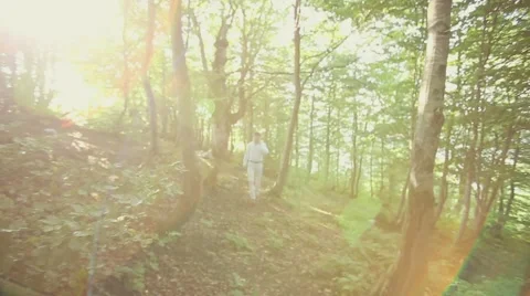 Young business man talking on cell phone at nature. Stock Footage 52320439