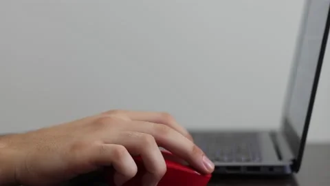 Young business man is using a laptop and working from home. Stock Footage 144757432