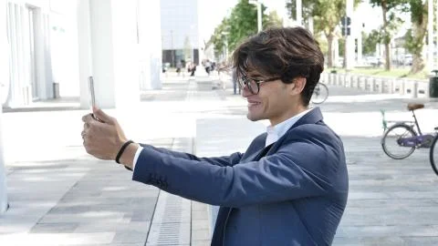 Young business man using tablet computer outdoor Stock Photos