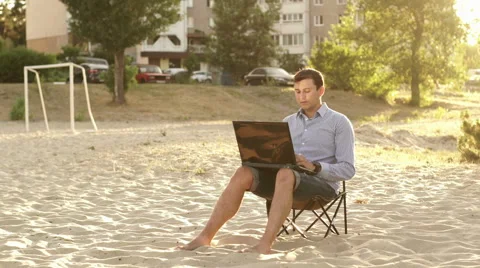 Young Business Man Working Remotely on Beach Stock Footage 65021902