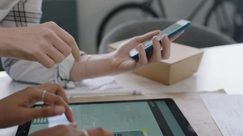 Young business team brainstorming software developers designing mobile Stock Footage 96815892