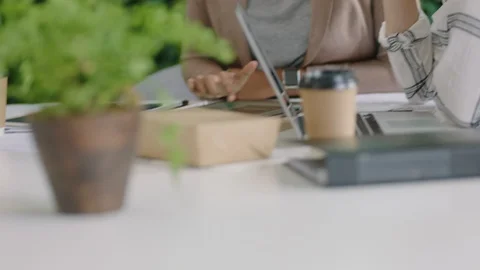 Young business team brainstorming software developers designing mobile Stock Footage 96820446