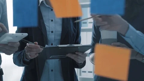 Young business team working on a creative project Stock Footage 108420889