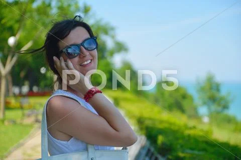 Young business woman using mobile phone outdoor Stock Photos