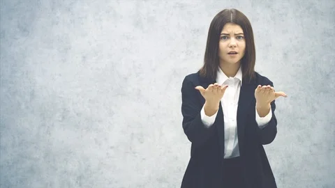Young businesslady has some problems and is angry. She is talking desperately Stock Footage 118022699