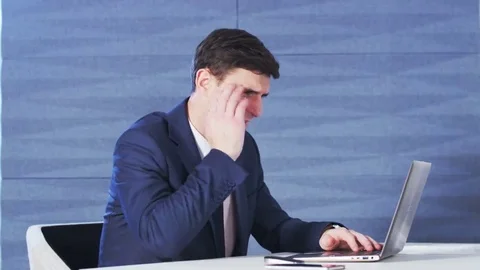 Young Businessman Cannot Concentrate on Work Stock Footage 69206914