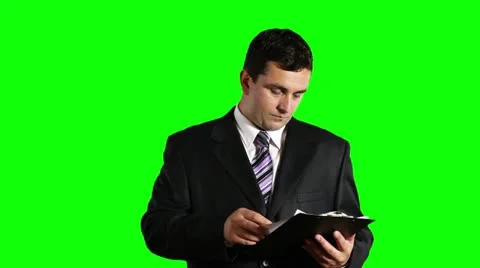 Young Businessman Checking Contract Greenscreen Stock Footage 12568445