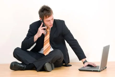 Young businessman with computer Stock Photos