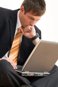 Young businessman with computer Stock Photos