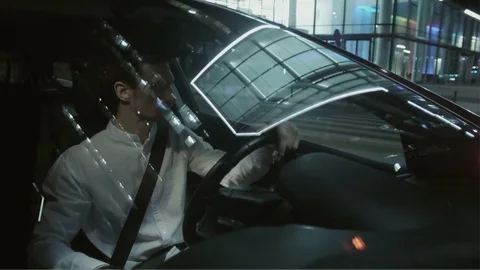 Young Businessman Doing a Sharp Left Turn with his Car Stock Footage 78642720