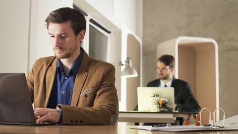 Young Businessman Feeling Distracted During Work Stock Footage 70919123
